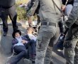 כוחות משטרה ומג״ב מפנים מפגינים נגד הגיוס בבסיס תל השומר, שוטר נפצע
